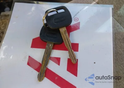 2000 Toyota Corolla Ce z USA, uszkodzony, nr VIN 1NXBR12E6YZ400335